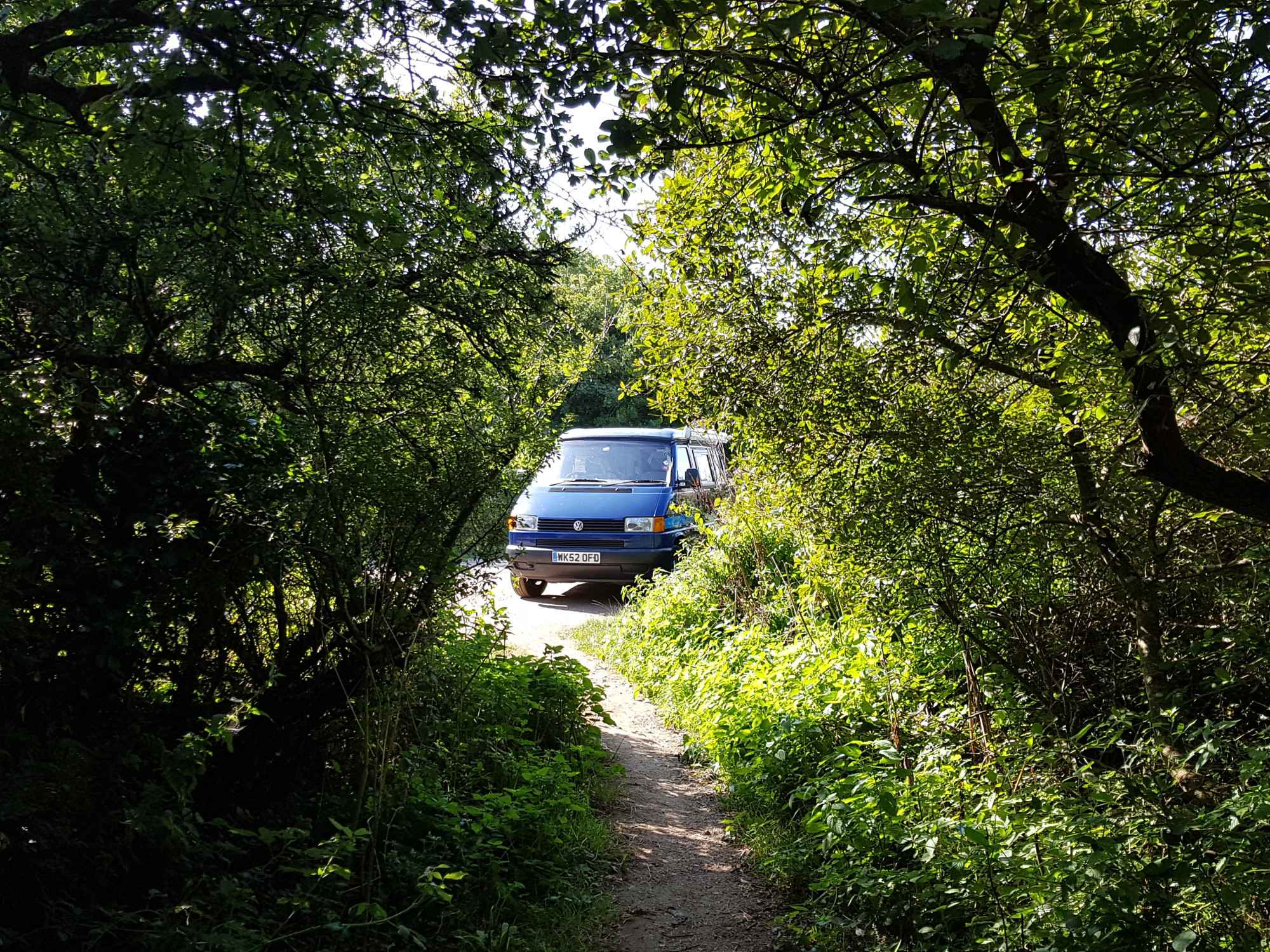 A VW T4 campervan called Big-Blue and St. Madron's Well for hire in Teignmouth, Devon
