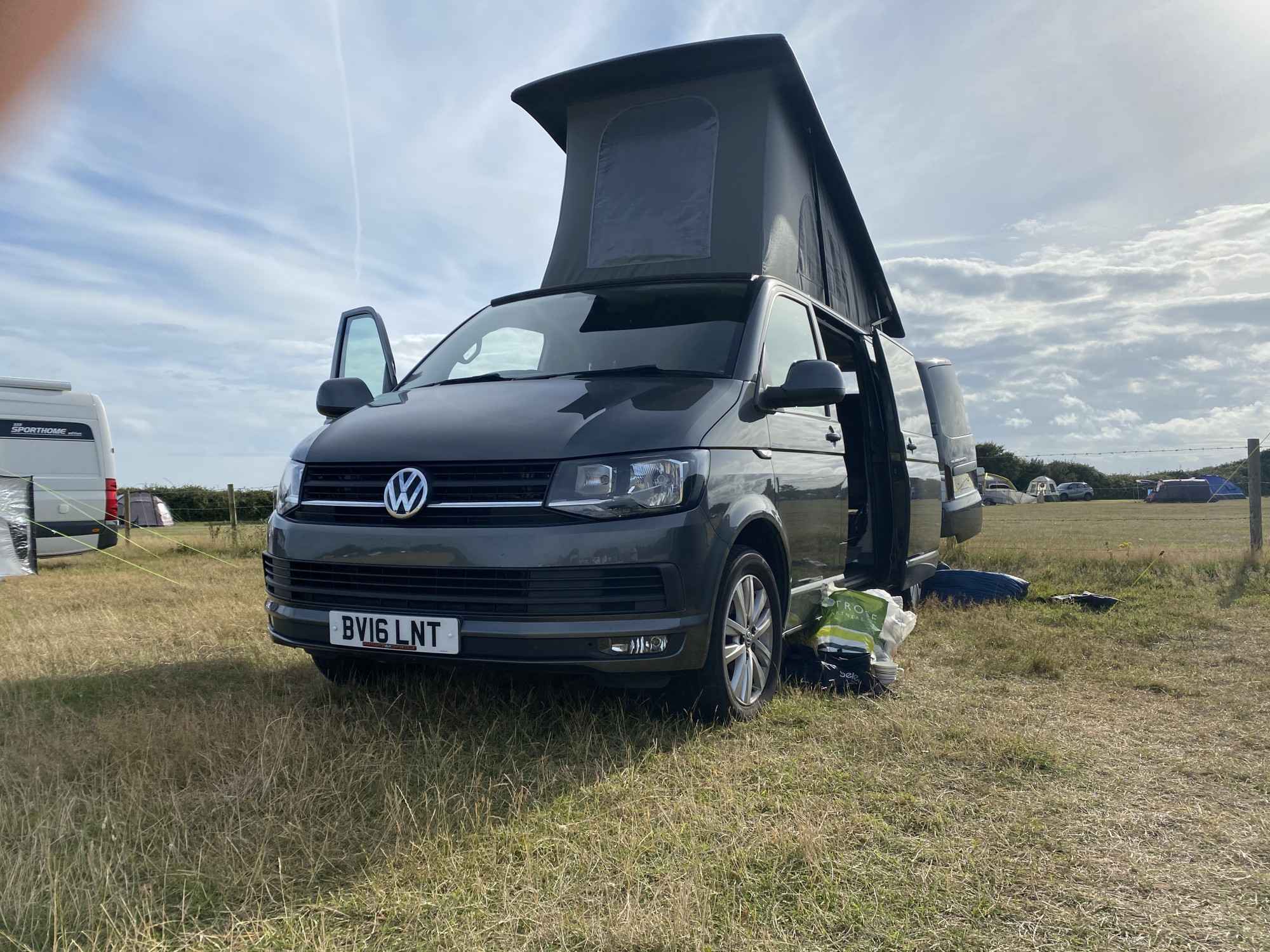 A VW T6 Campervan called CopperLeaf-0824 and With hood up, creates lots of space for hire in Market Harborough, Leicestershire