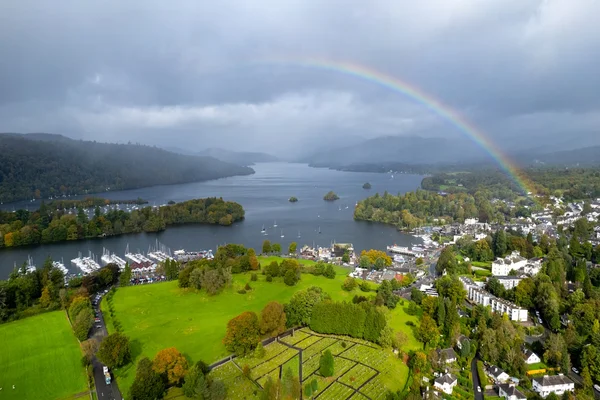 A Rainbow in The Sky Over a Small Town