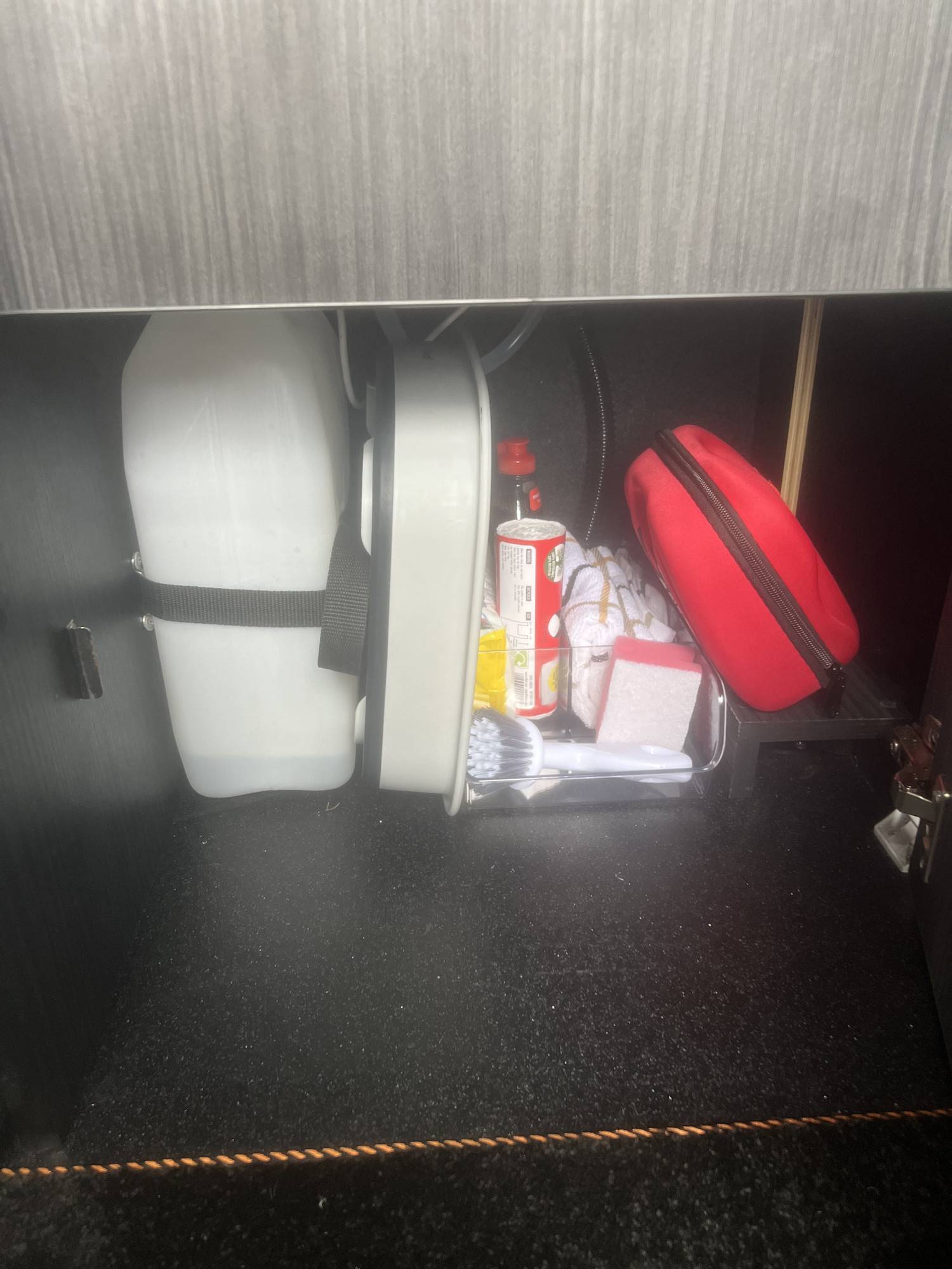 A VW T6 Campervan called T6-4Motion and Under Sink Water and Cleaning Equipment for hire