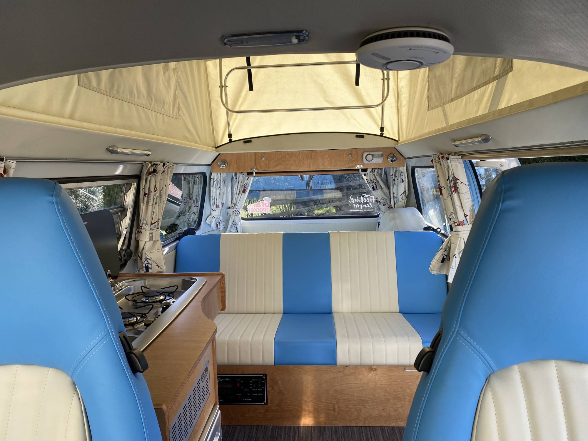 A VW T2 Classic Campervan called Campo-TV-Star and Baby blue and cream seats for hire in Bideford, Devon