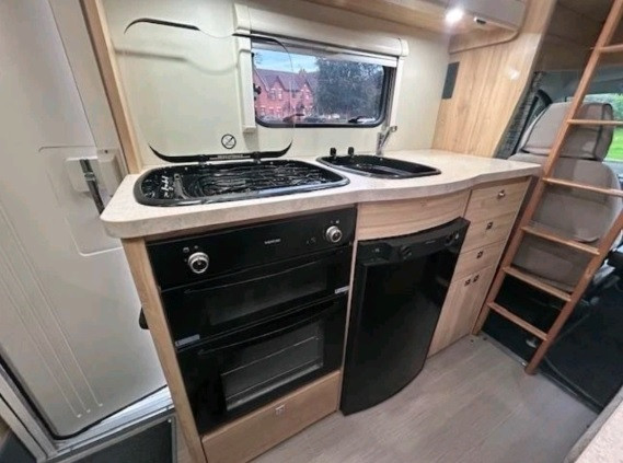 A OverCab Motorhome called Elder and for hire 