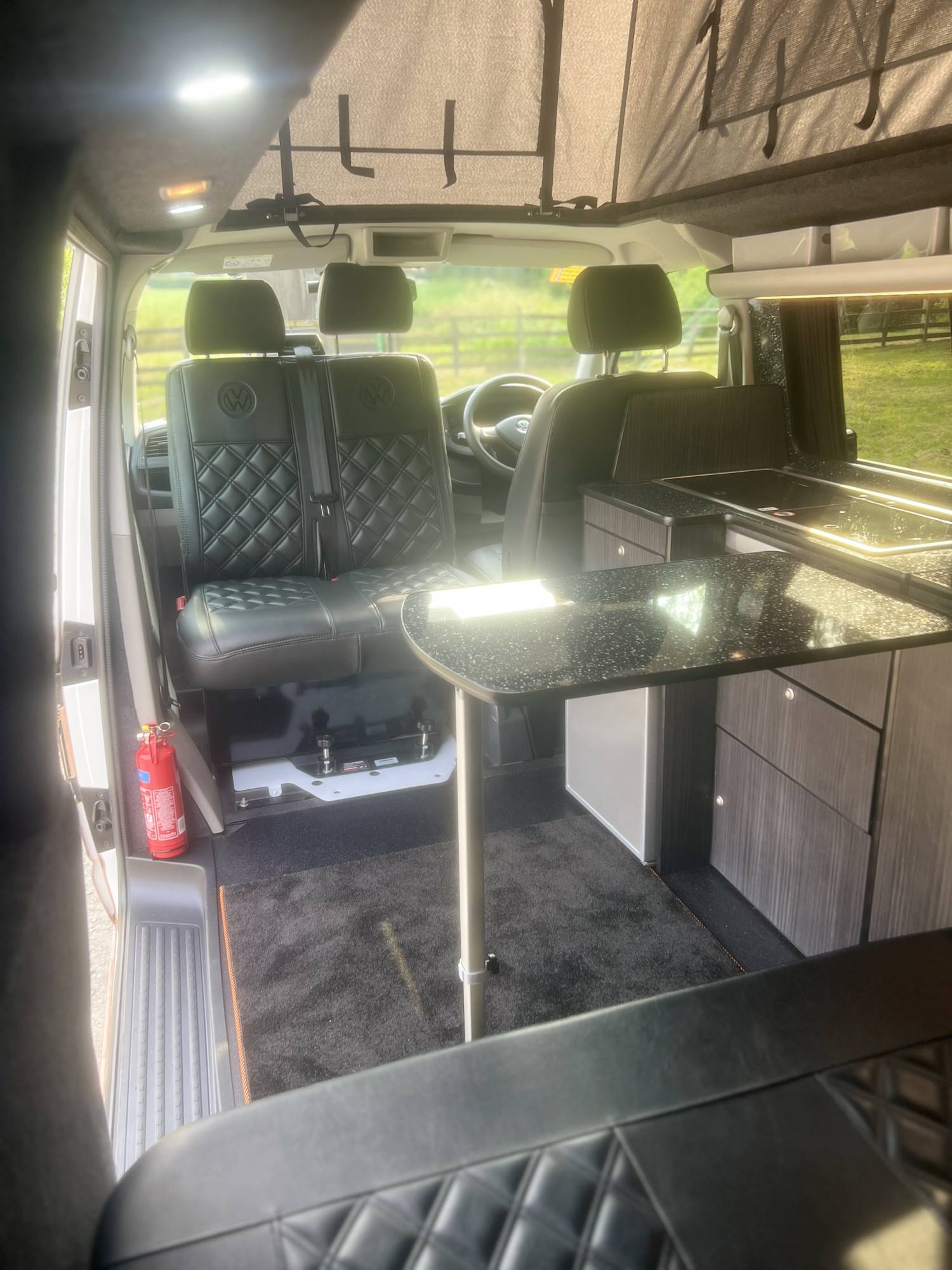 A VW T6 Campervan called T6-4Motion and Dinning Area for hire