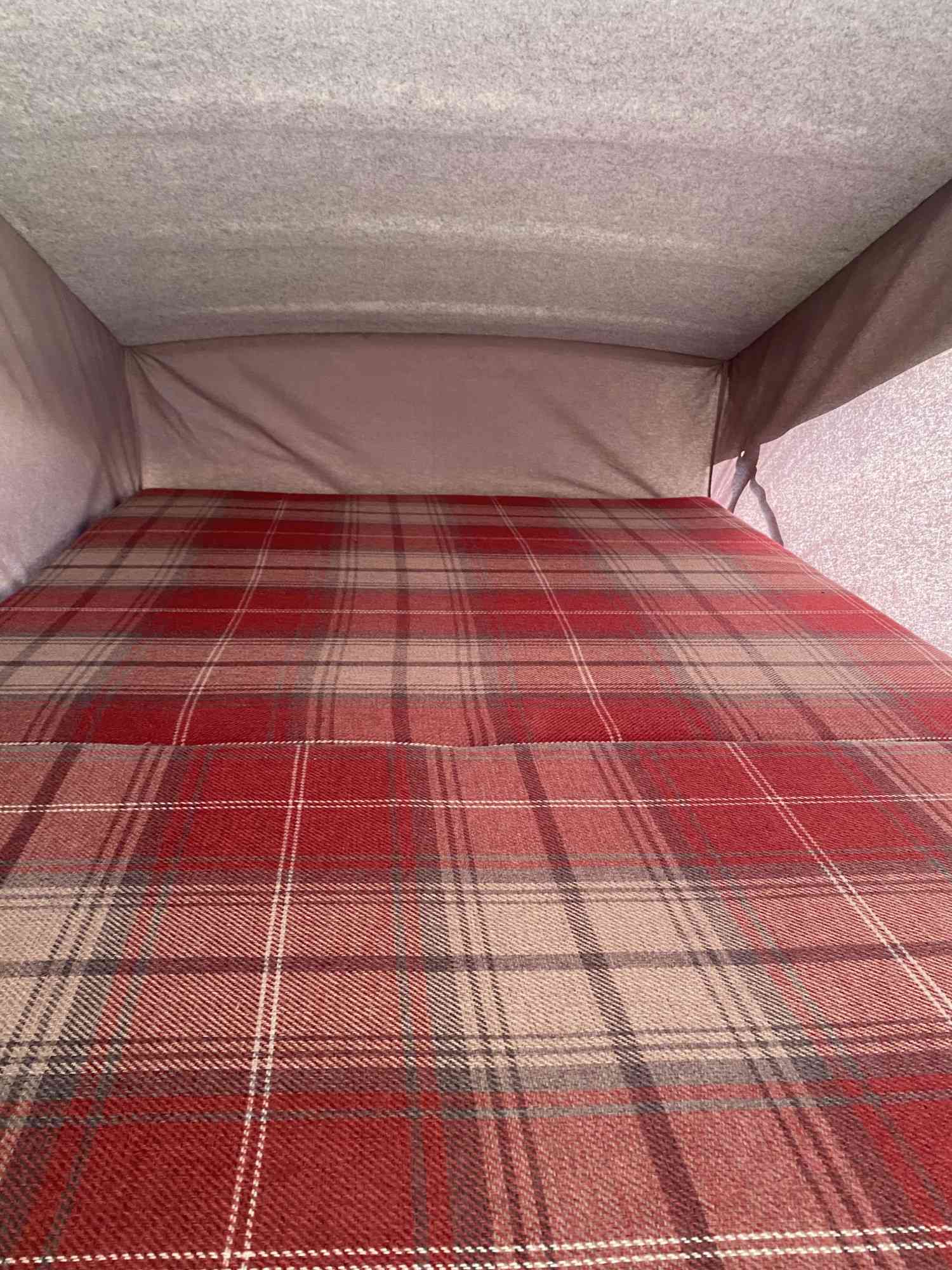 A VW T2 Classic Campervan called Ruby-Rose and Ruby Rose's double roof bed for hire in Bideford, Devon