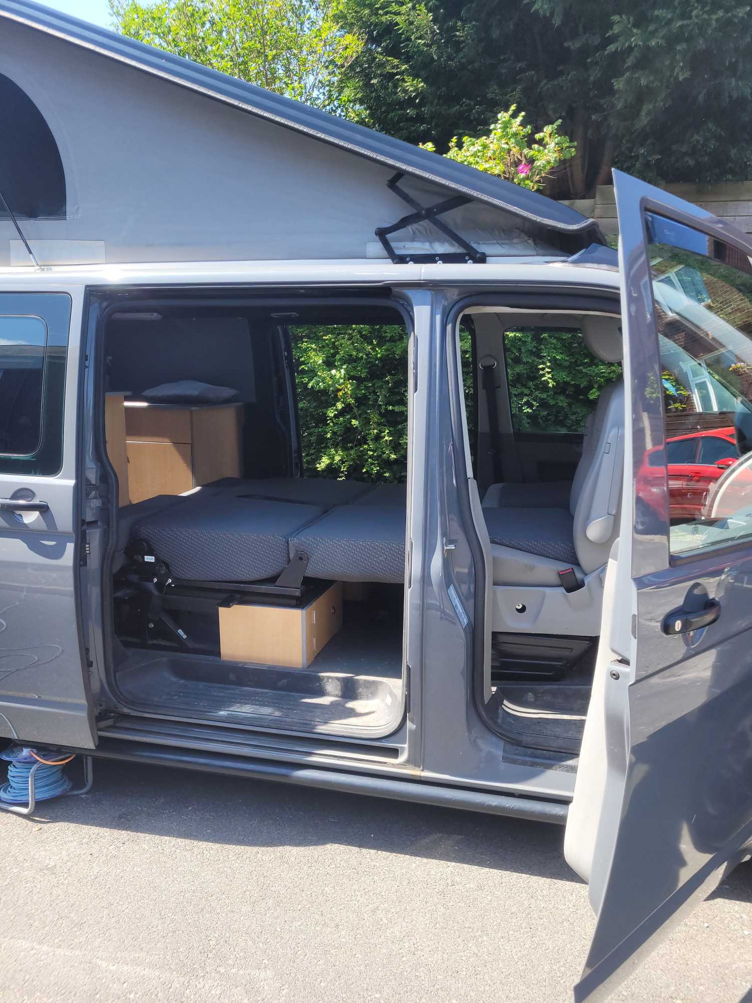 A VW T5 Campervan called Grey-Wolf and for hire in Oldham, Lancashire
