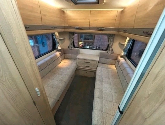 A OverCab Motorhome called Elder and for hire 